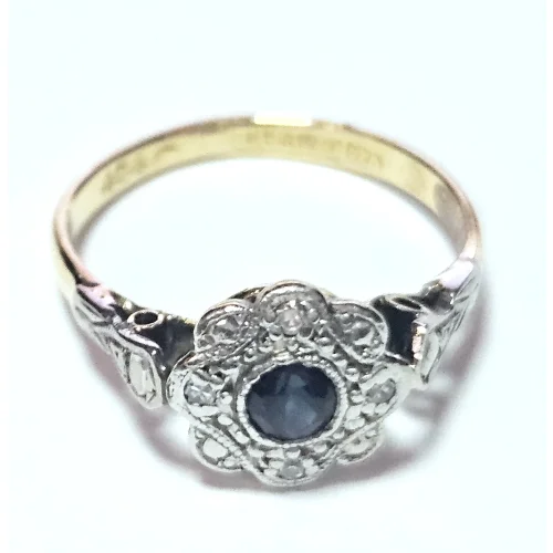 Złoty pierścionek z szafirem i diamencikami 2,64g